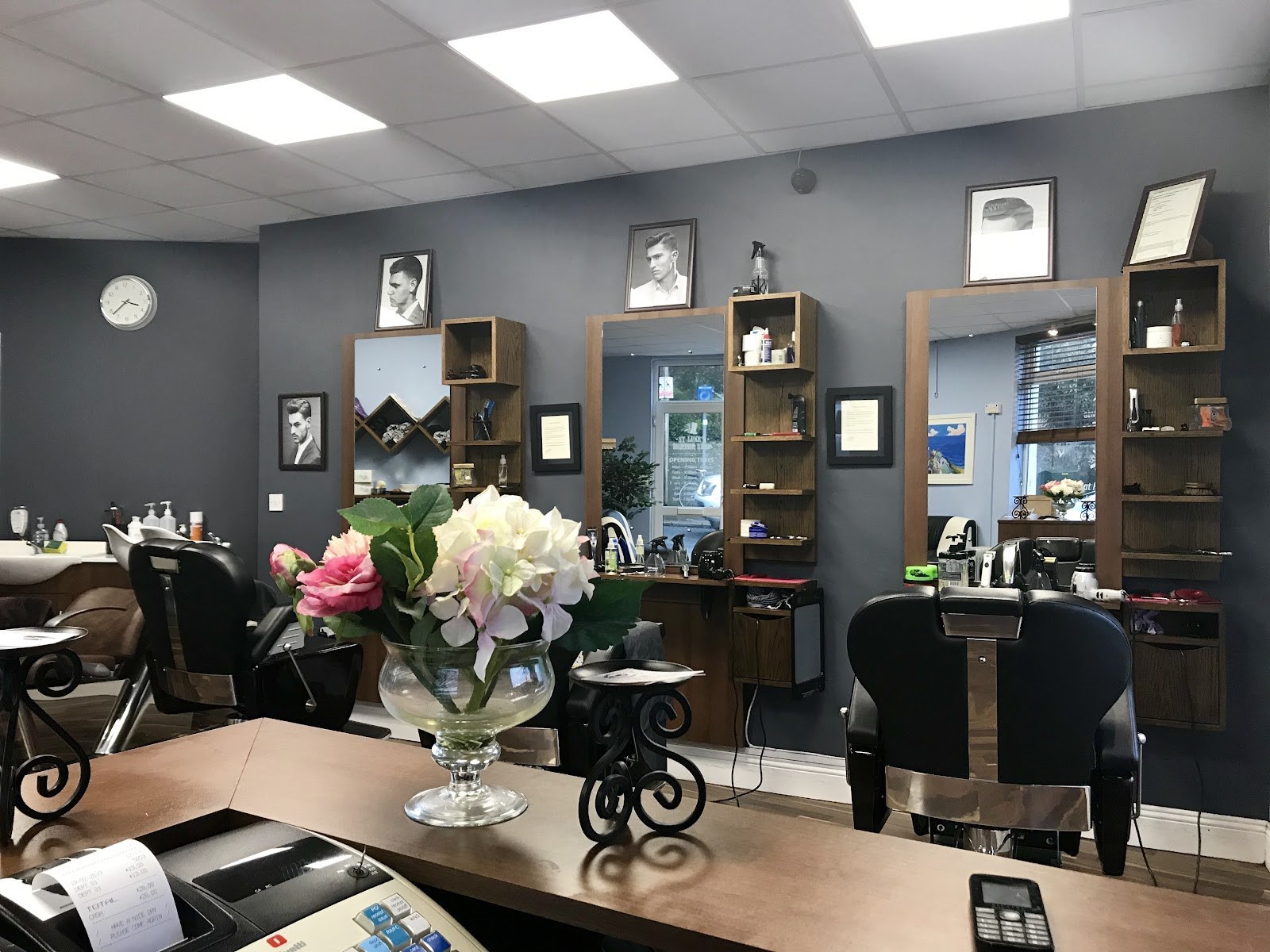 Barber chairs, mirrors and the reception at St Luke’s Barber Shop, Cork